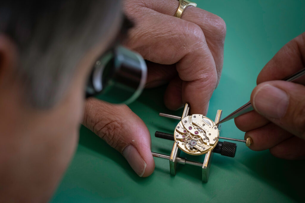 (c) Christopher Ison Photography – ISON_200715_Allnutt_540176 A closeup of Geoff Allnutt of JE Allnutt & Son repairing a watch at his shop in West Street, Midhurst, Sussex.