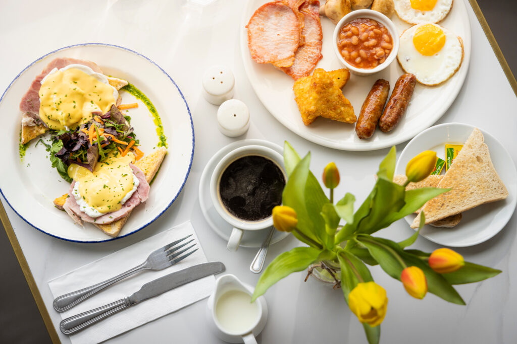 (c) Christopher Ison Photography – ISON_240819_TT_Kemaellis_0906 A top down closeup view of two breakfasts from Kemaellies cafe on North Street in Midhurst, West Sussex.