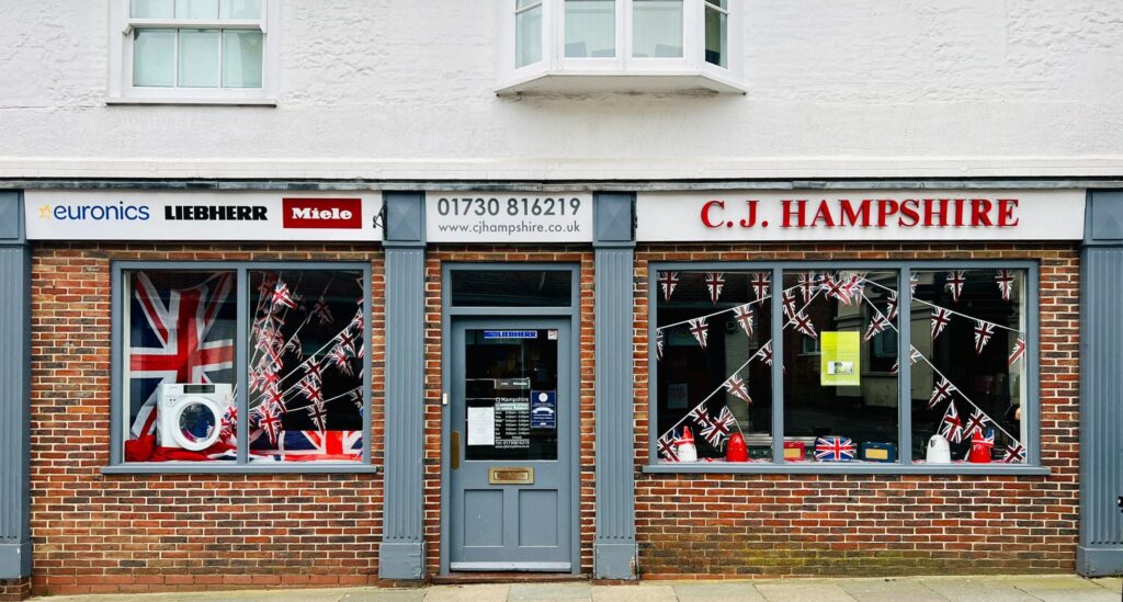 (c) CJ Hampshire – shop front 2 The exterior shop front of CJ Hampshire electrical good in Midhurst, West Sussex.